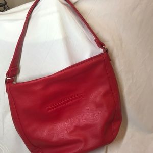 Red shoulder bag.  Newell by thirty-one